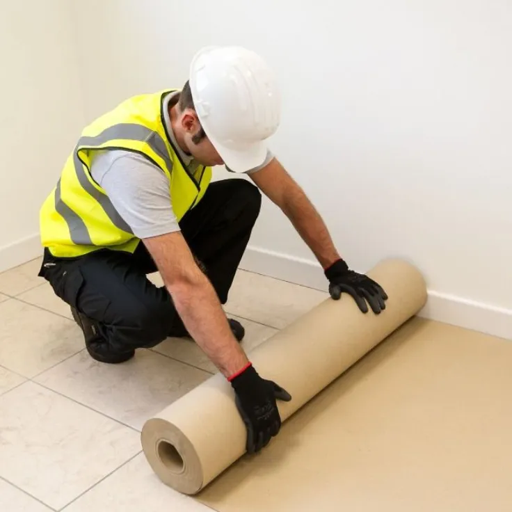 Protective coating being applied to a concrete surface